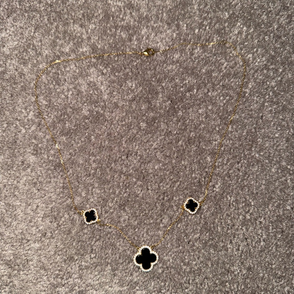 Elegant Gold and Black Clover Necklace